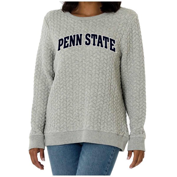 model wearing women's heather gray Kinsley quilted crew neck sweatshirt with arched Penn State